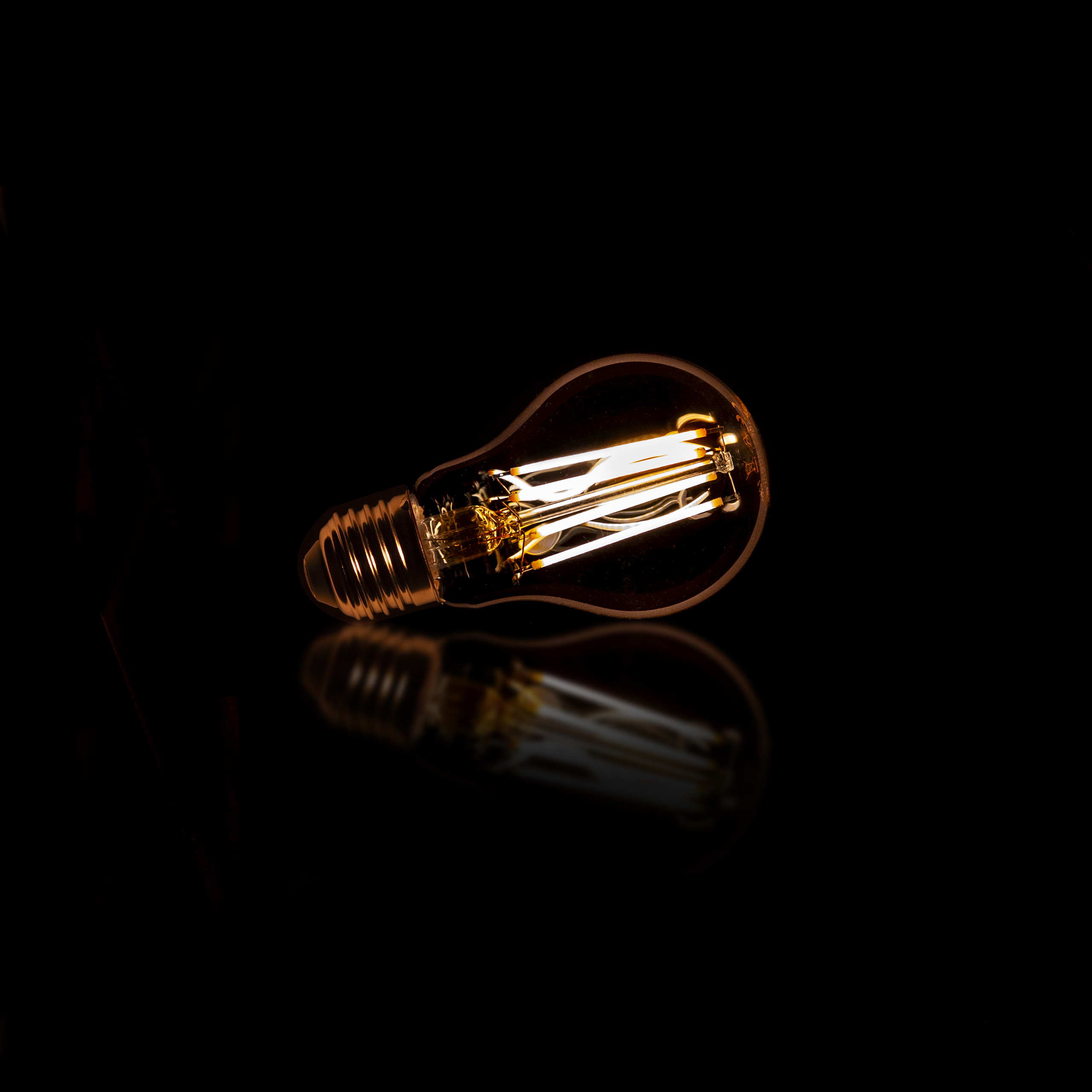 Source lumineuse LED A60 filament poire - Verre ambré